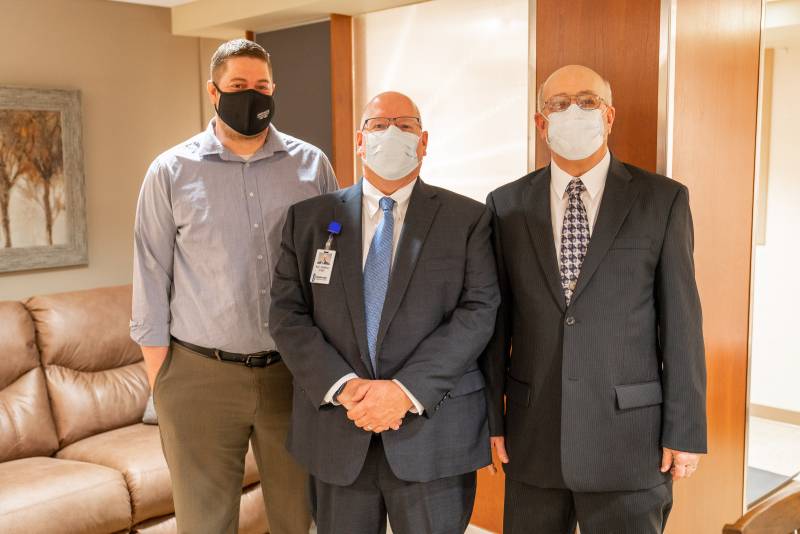 Joey Patek, Manager at Montgomery’s Furniture, K.C. DeBoer, President &amp; CEO, Prairie Lakes Healthcare System, &amp; John Holley, Secretary, Watertown Rotary Club